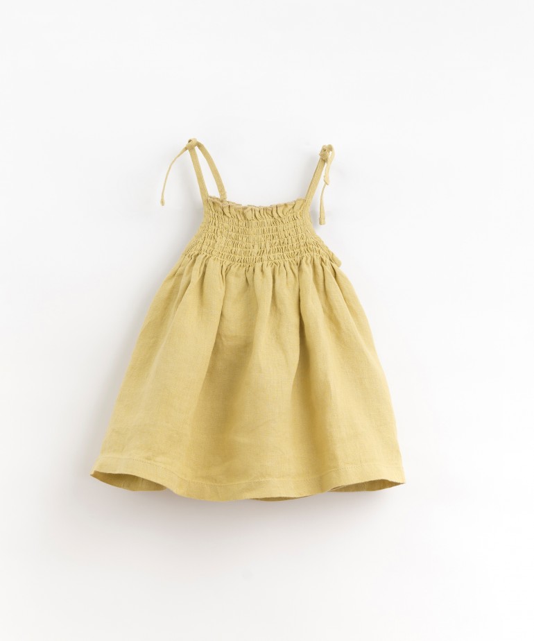 Linen dress with bows on the straps