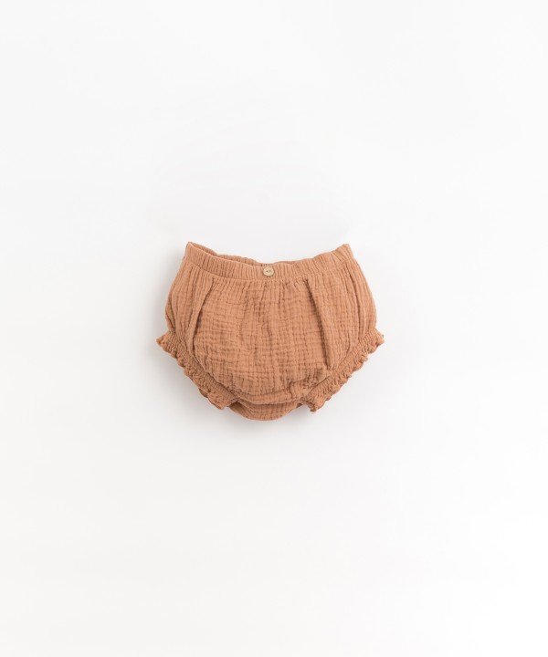 Organic cotton underpants with decorative coconut button