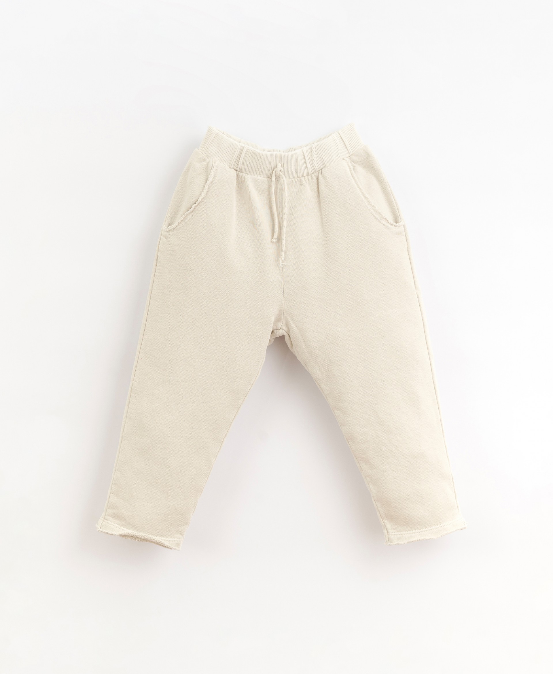Trousers with pockets and decorative drawstring | Organic Care