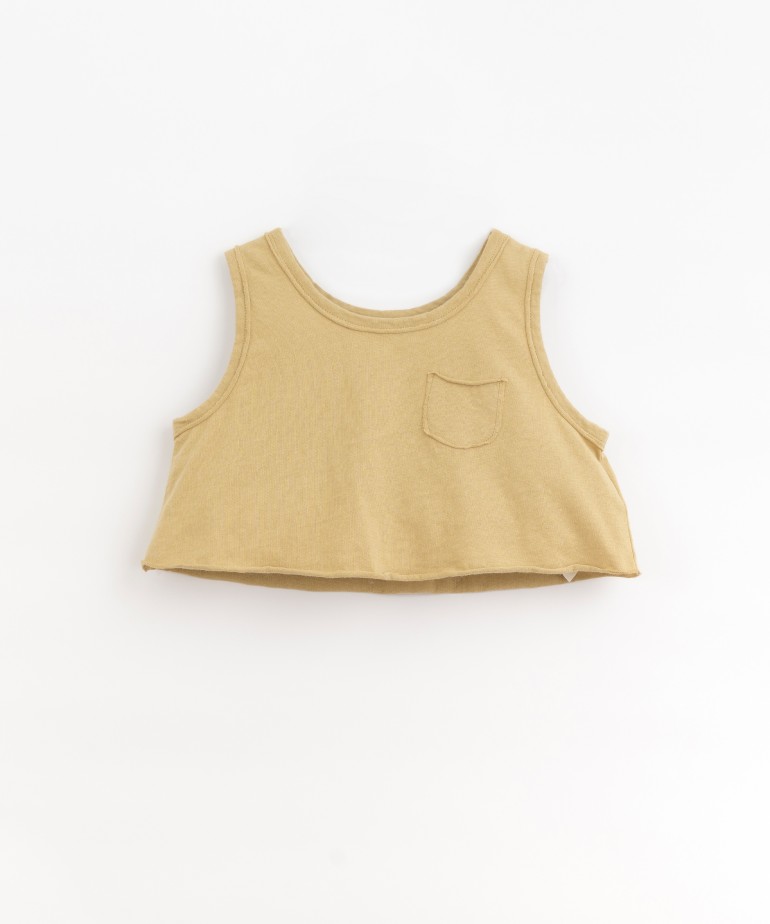 Short top with breast pocket