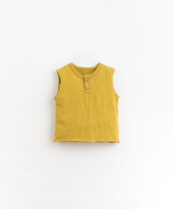FLAMÉ JERSEY SLEEVELESS T-SHIRT