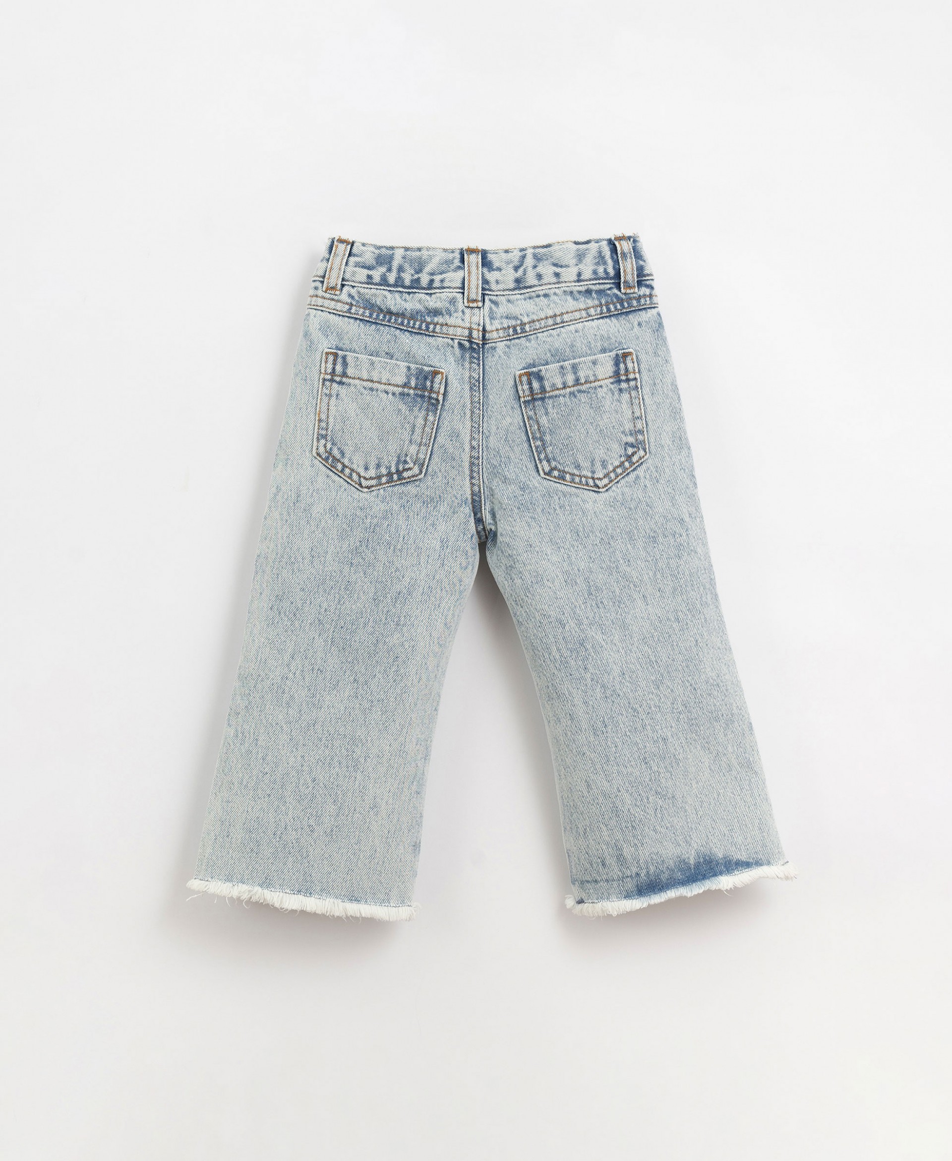 Denim trousers with frayed hem | Organic Care