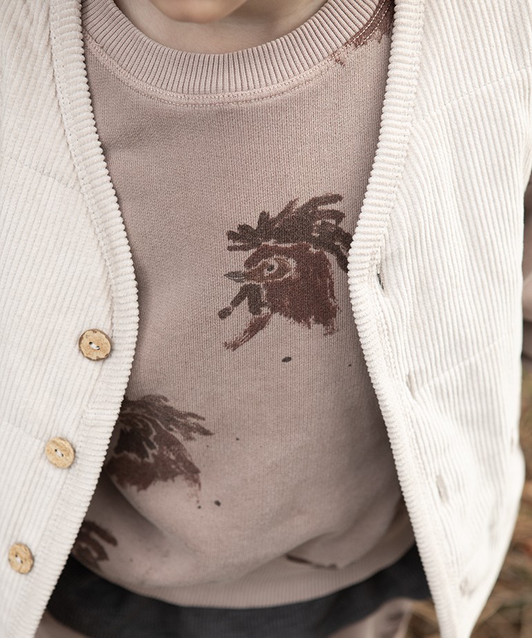 Sweater with natural dye and print