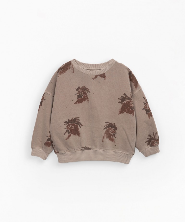Sweater with natural dye and print