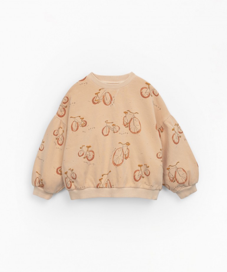 Natural fibre sweater with bicycles print