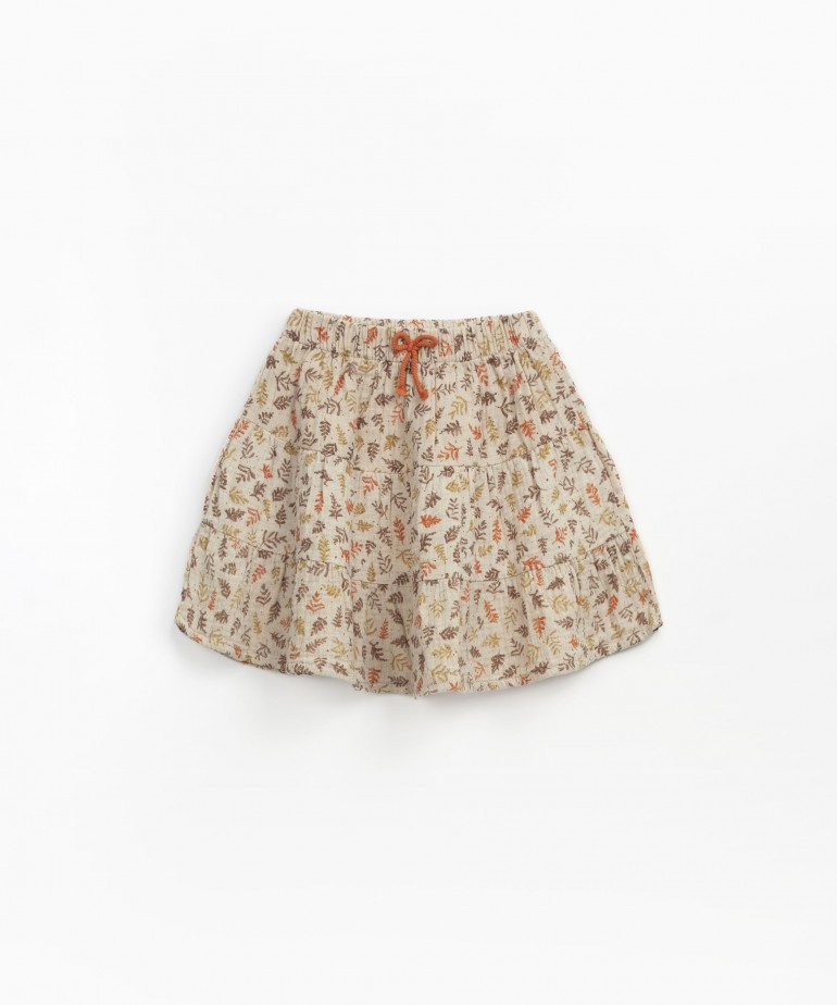 Cloth skirt with twigs print 