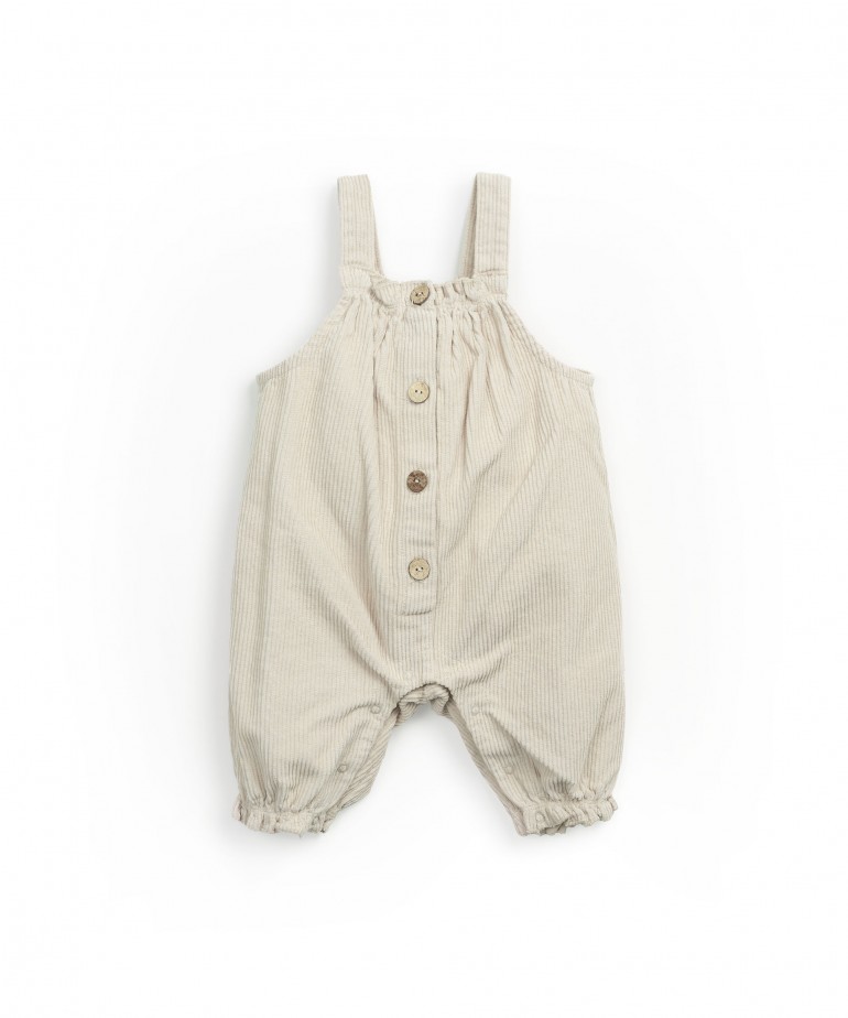 Corduroy jumpsuit with coconut button opening