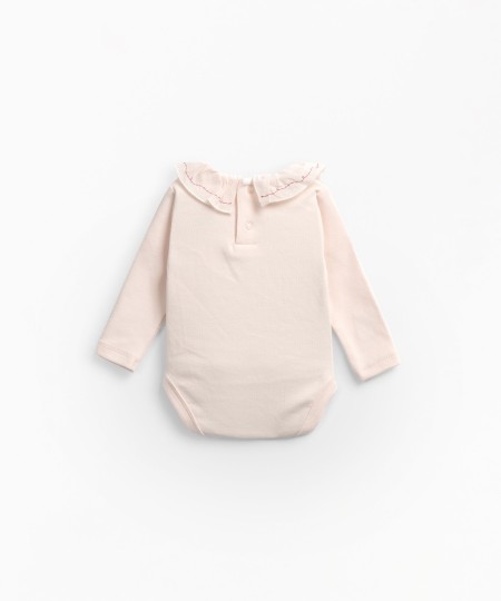 Body con apertura a molle