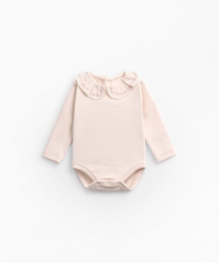 Body with spring clip opening