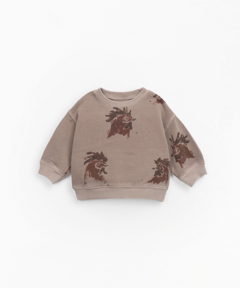Sweater with roosters print