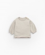 Jersey-stitch T-shirt with coconut buttons on the shoulder | Mother Lcia