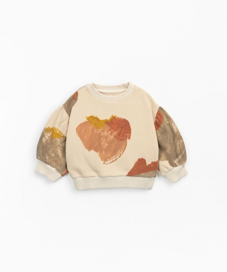Sweater with natural dye and abstract print