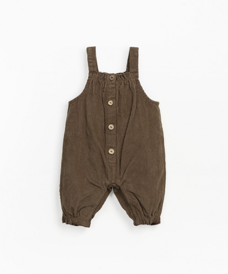 Corduroy jumpsuit with coconut button opening