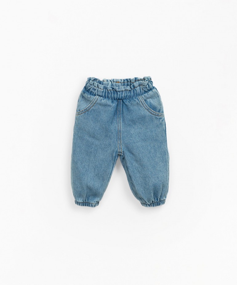 Denim trousers with pockets