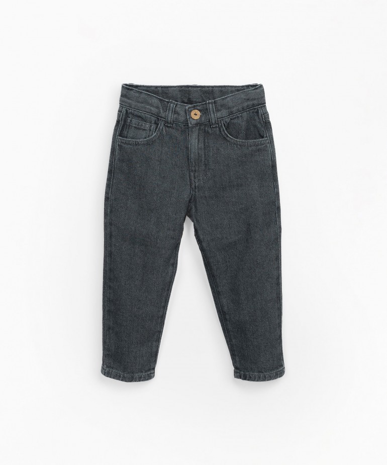 Denim trousers with adjustable waist