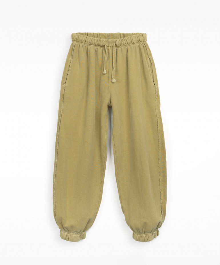 Jersey stitch trousers with sharp cut details