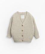Knitted jacket with coconut button opening | Mother Lcia