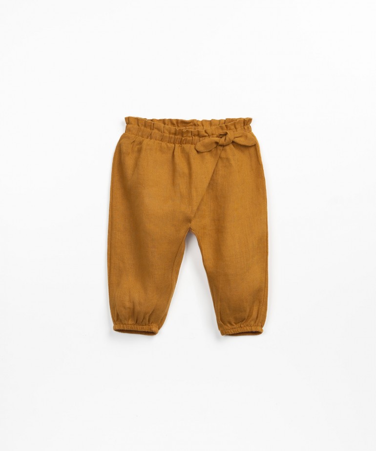 Linen trousers with double-layer detail