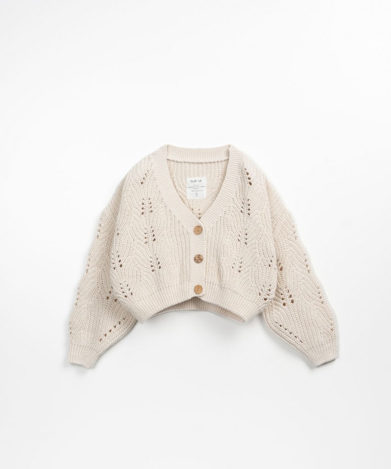 Knitted cardigan with coconut buttons