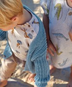 Cardigan en maille tricote avec un col en V | Textile Art