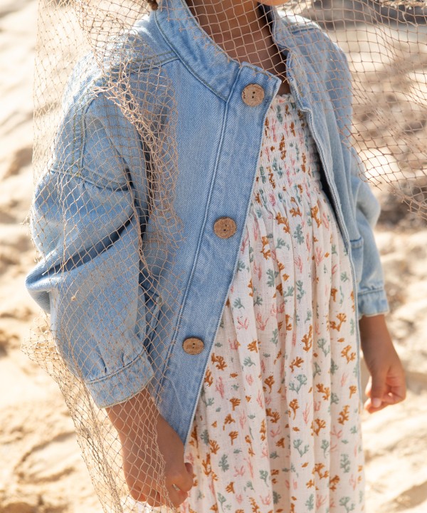 Denim jacket with frayed hem