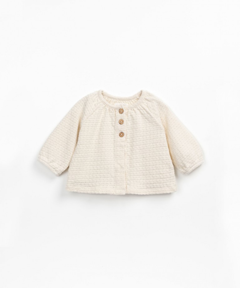 Jersey-stitch jacket with coconut buttons