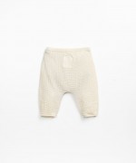 Pantalon en tissu avec bouton de coco dcoratif | Textile Art