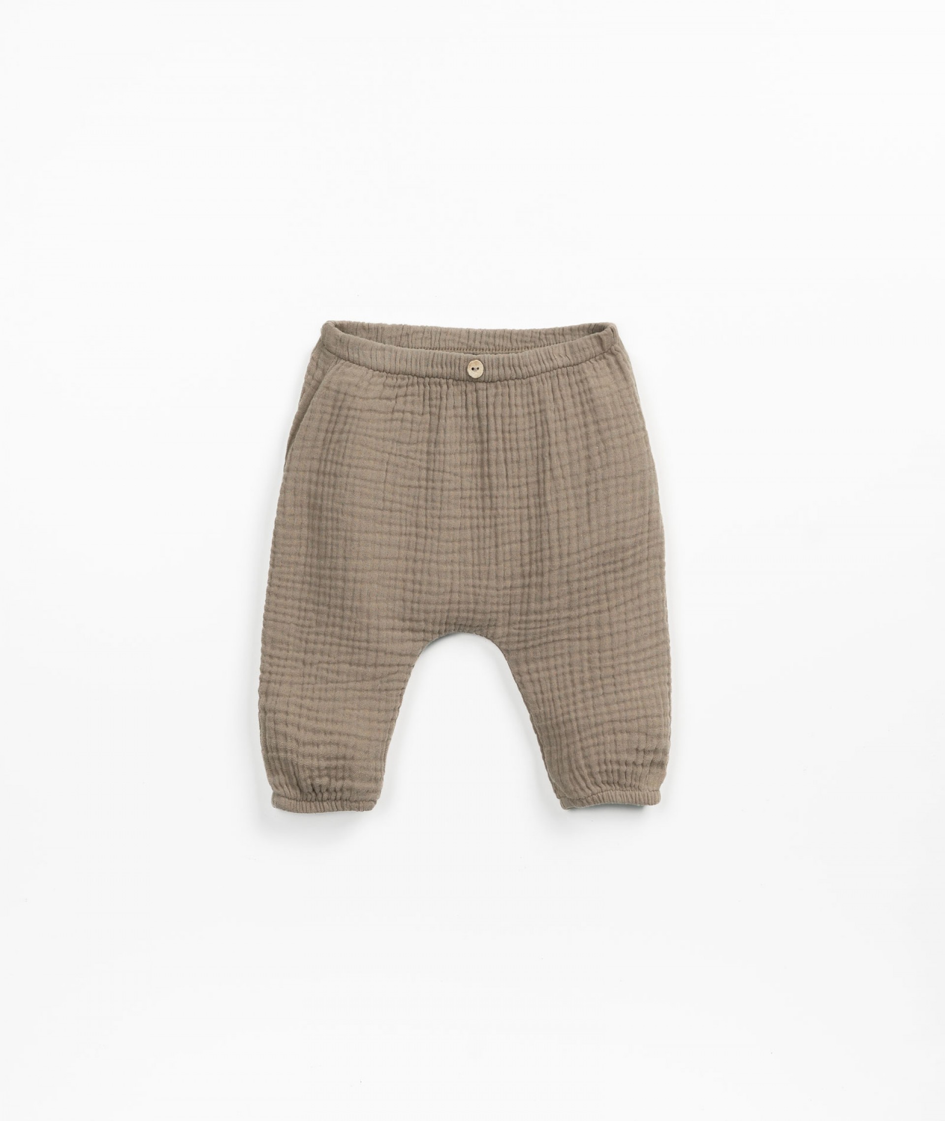 Pantalon en tissu avec bouton de coco dcoratif | Textile Art