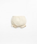 Pantaloncini con bottone decorativo in cocco | Textile Art