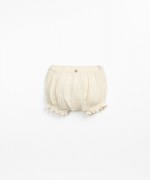 Shorts with decorative coconut button | Textile Art