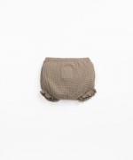 Shorts with decorative coconut button | Textile Art