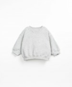 Plain sweater with a neck line detail | Textile Art