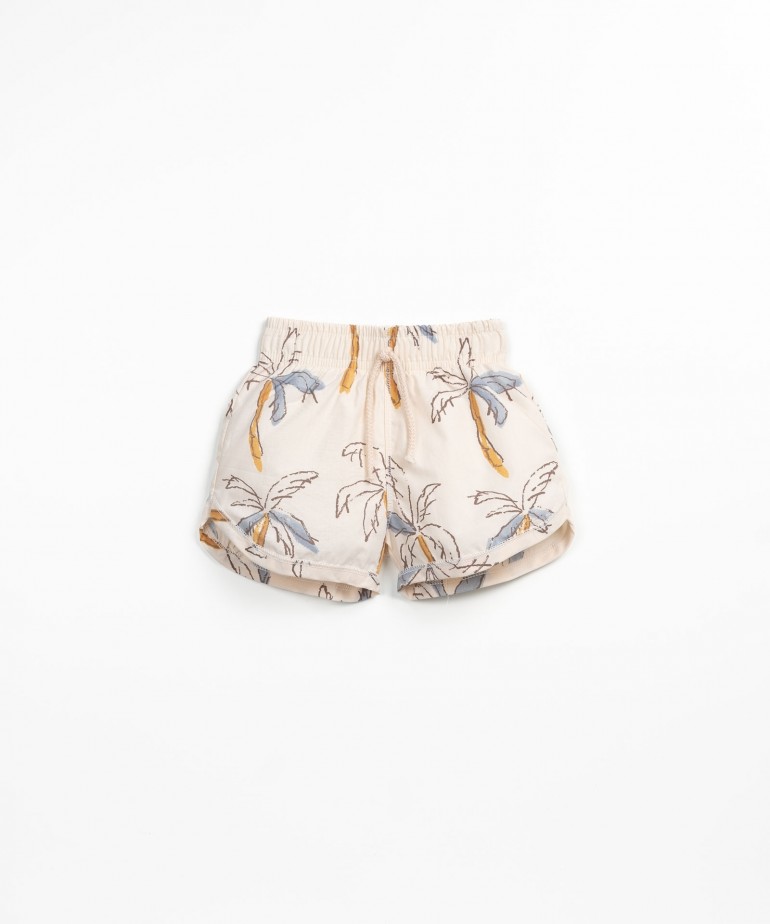 Swimming shorts with palm trees print