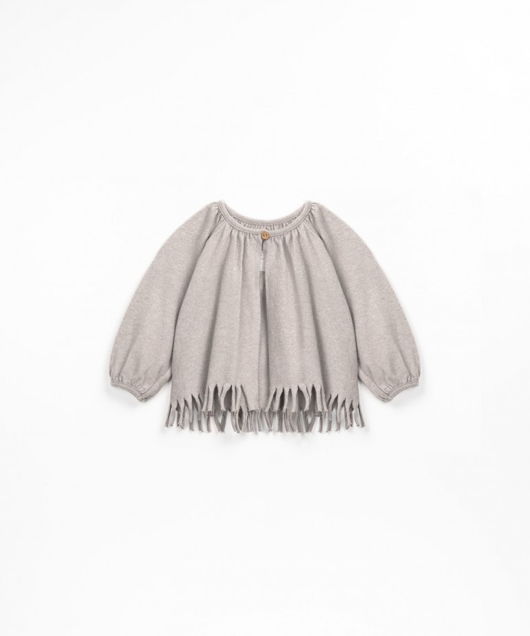 Jersey stitch jacket with fringes