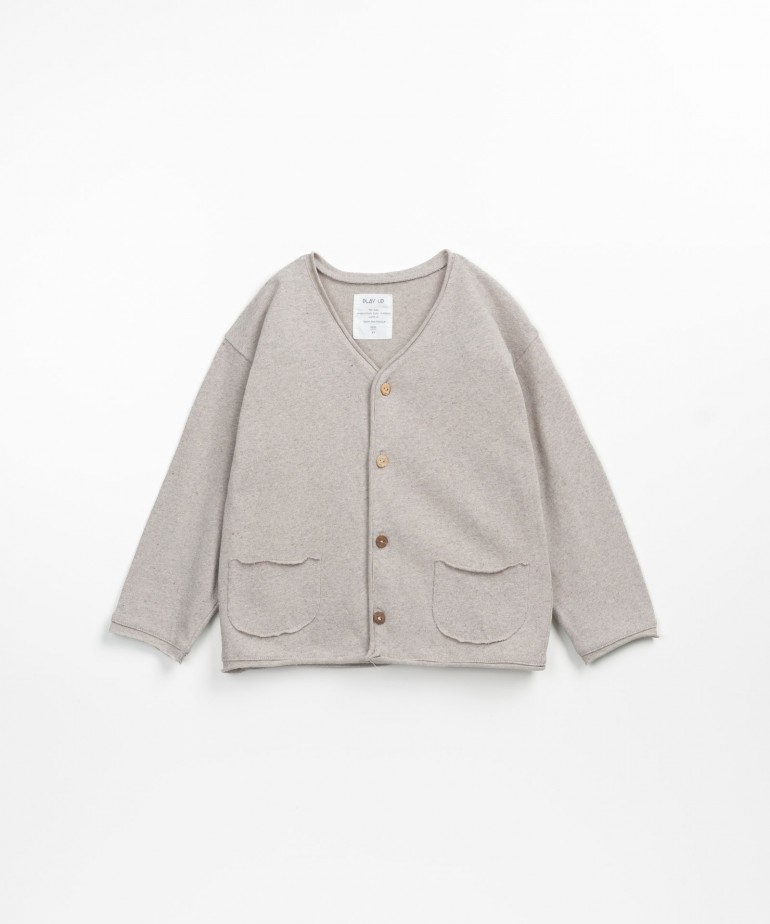 Jersey stitch cardigan in Re(Play) fibre