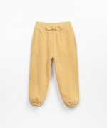 Pantaloni con tasche e laccio decorativo | Textile Art