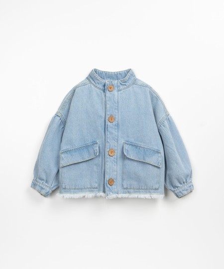 Denim jacket with frayed hem