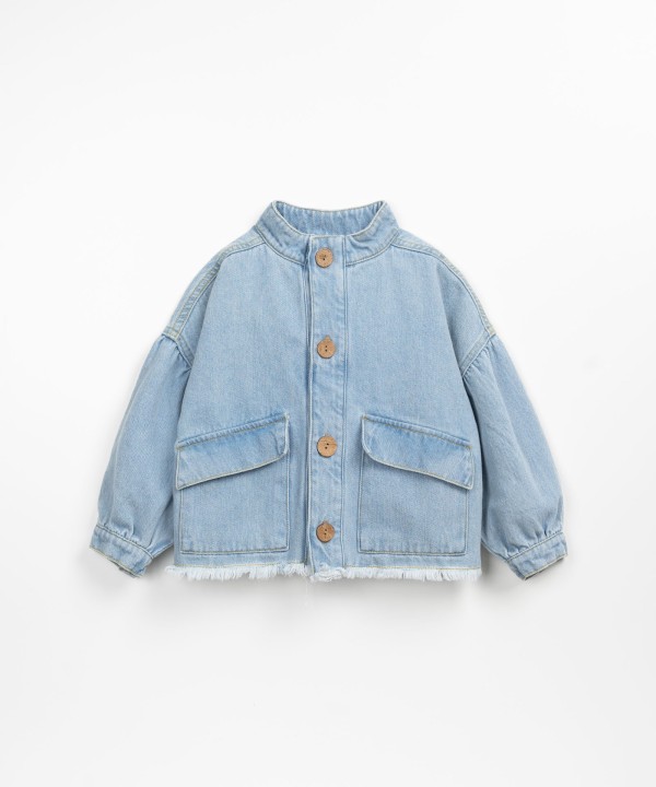 Denim jacket with frayed hem