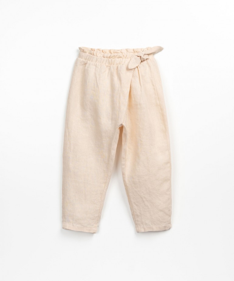 Linen trousers with decorative bow