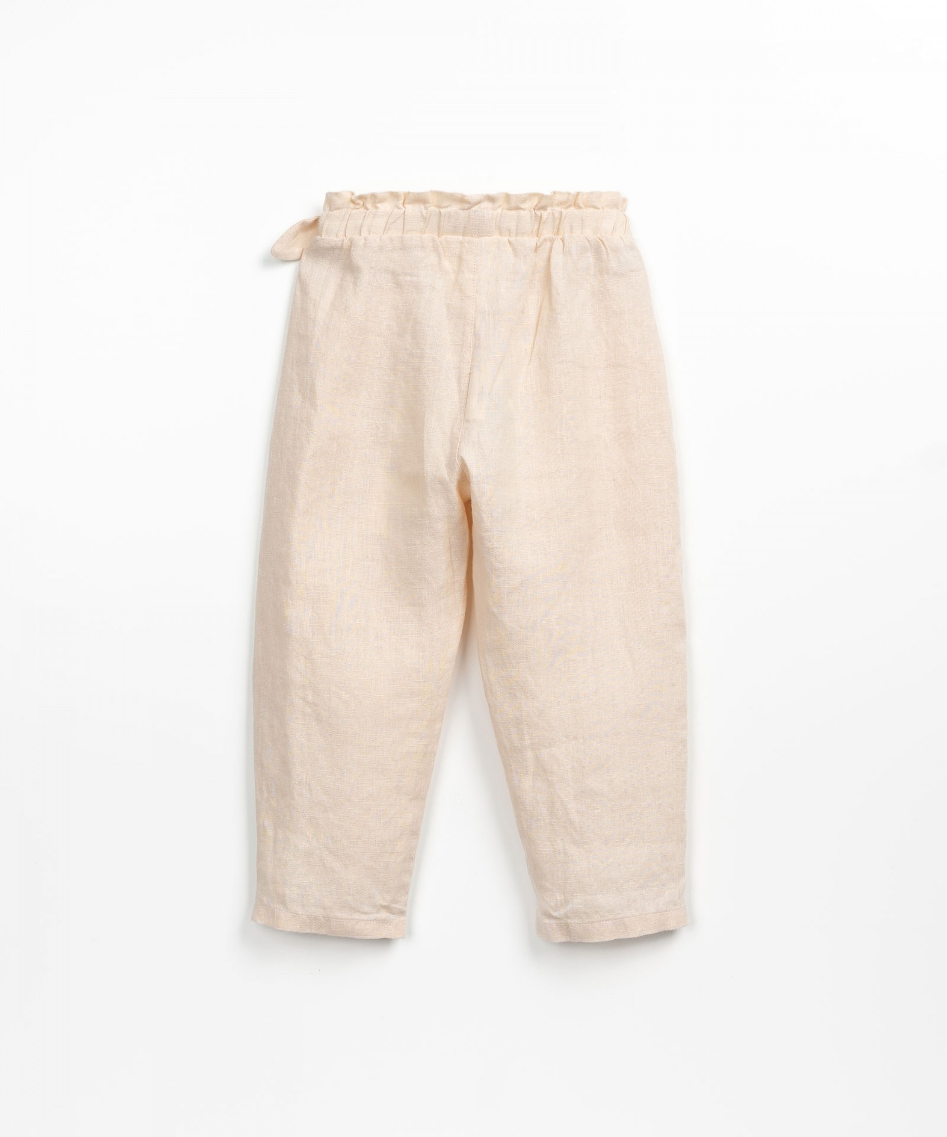 Linen trousers with double-layered detail | Textile Art