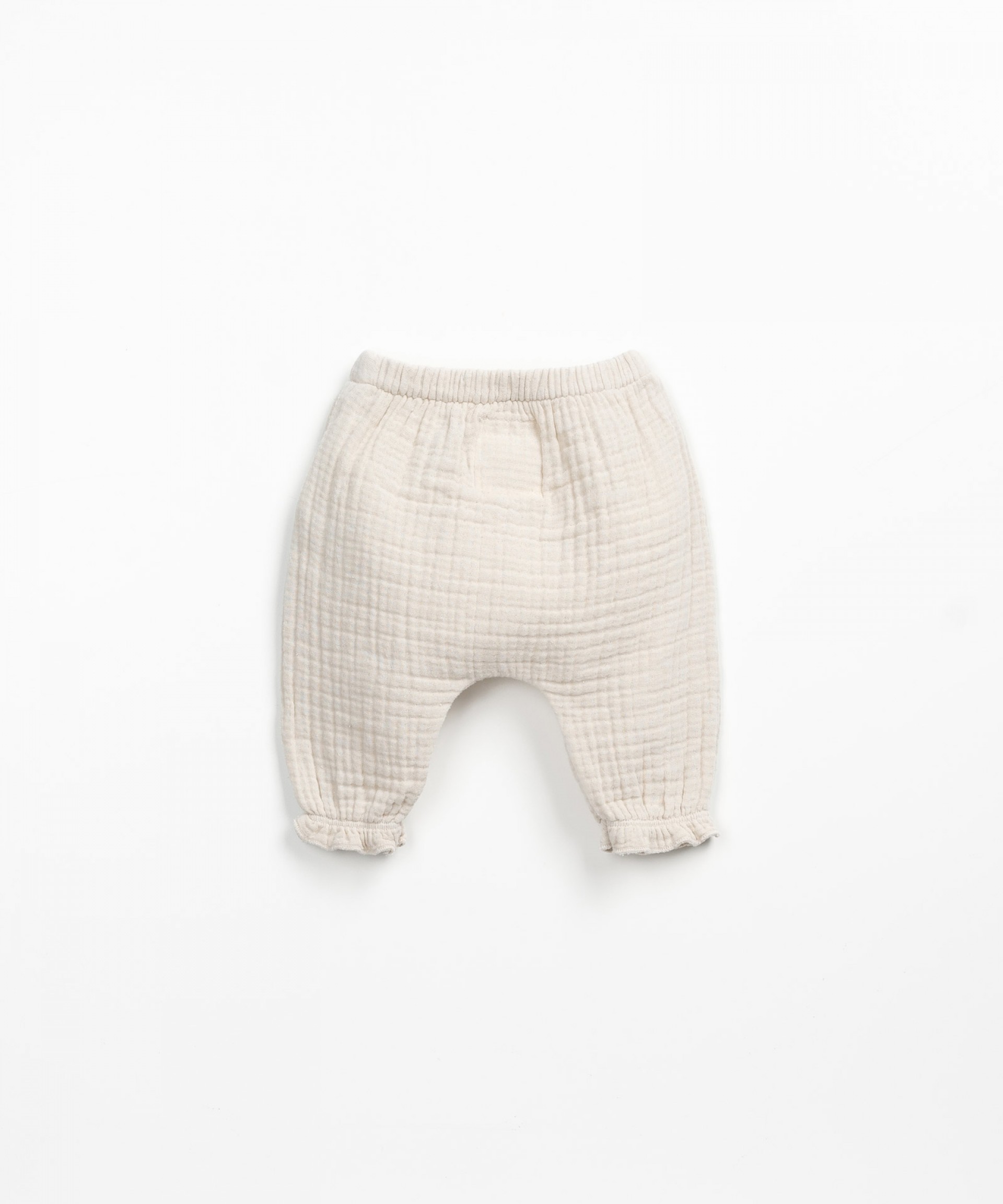 Woven pants with decorative buttons | Wooden Memories