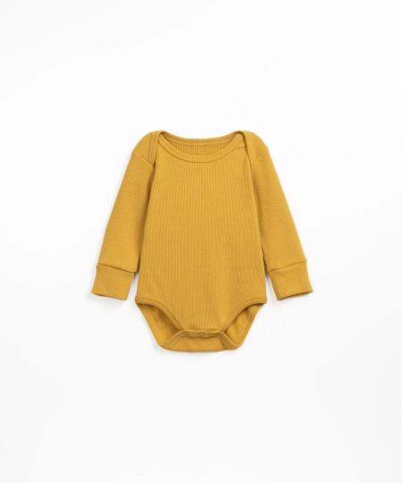 Bodysuit with double breasted shoulder