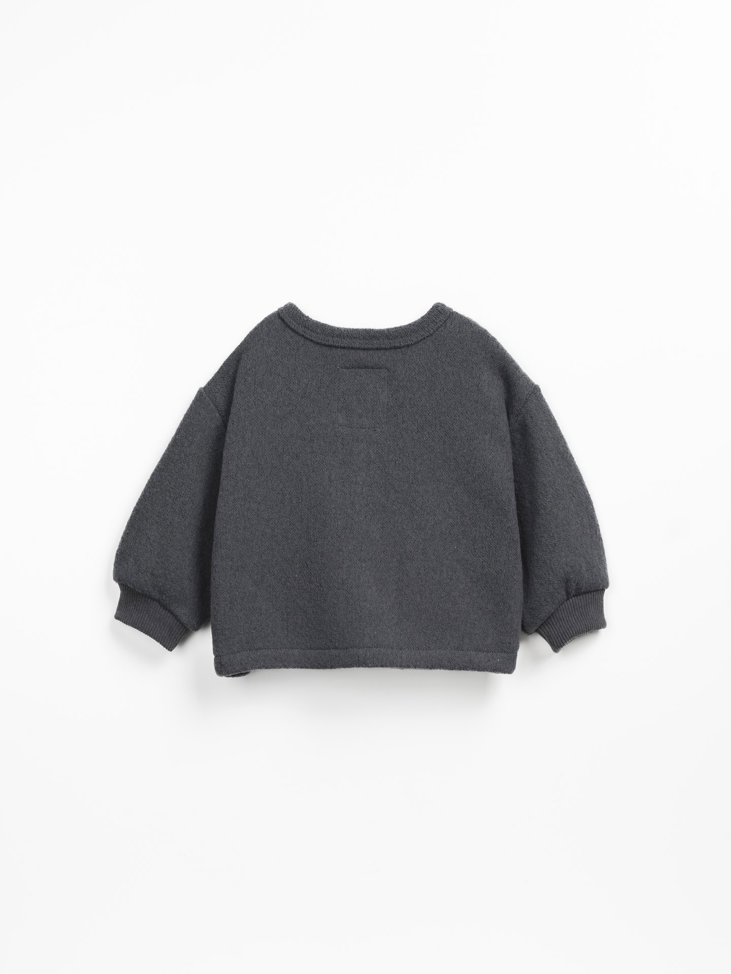 Jersey cardigan with carding on the inside