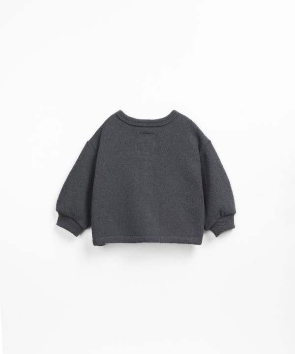 Jersey cardigan with carding on the inside