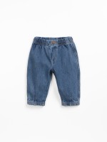 Denim pants with decorative button