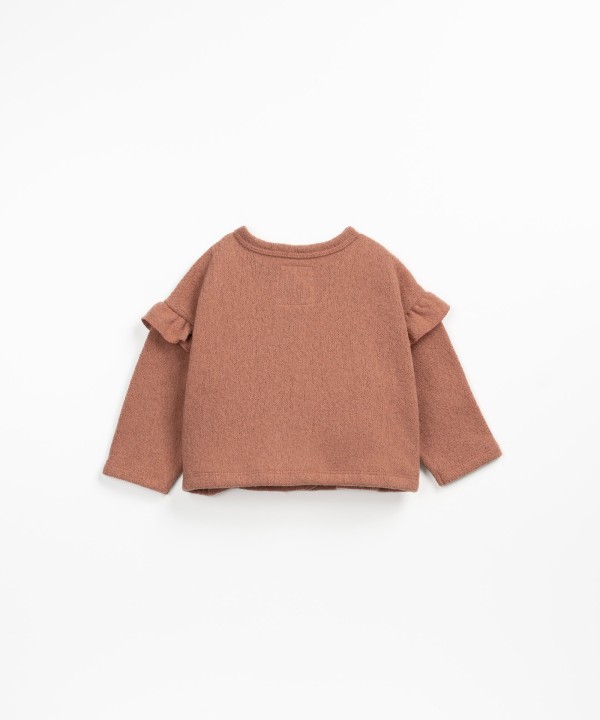 Cardigan with frills on the sleeves