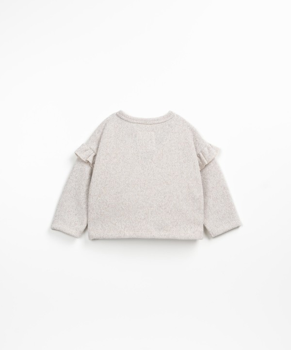 Cardigan with frills on the sleeves