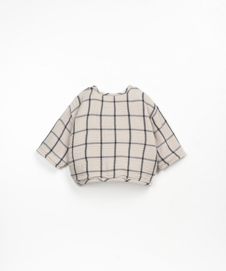 Cardigan with checkered pattern and fleece lining