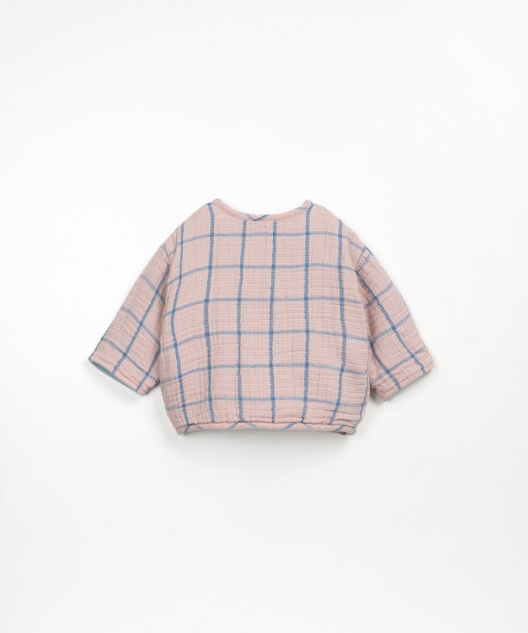 Cardigan with checkered pattern and fleece lining