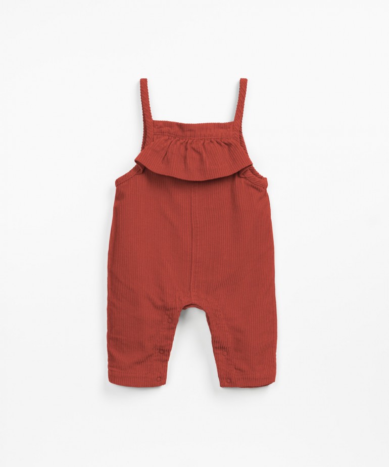 Corduroy jumpsuit with frill on the chest